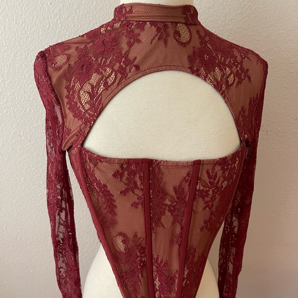 Super Sexy Burgundy lace top with  peak hole,  long sleeves with ruffles